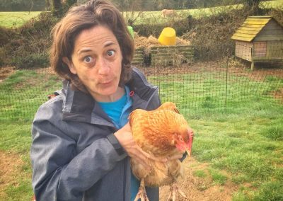 Melissa and one of her new chicken friends, Cornwall